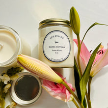  Scent of love candle. Hand poured in United States. Floral and earthy scent. 8 oz candle in a glass jar.