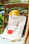 Cotton, Handmade, Purposeful tote bag. Sustainable and hand embroidered by refugee moms.