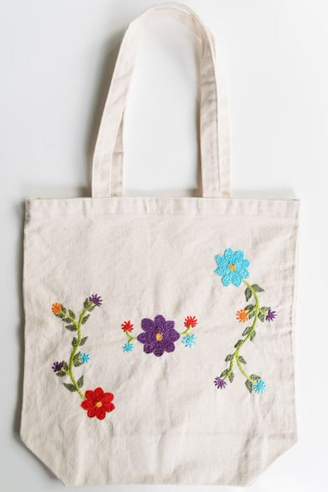 Cotton, Handmade, Purposeful tote bag. Sustainable and hand embroidered by refugee moms.