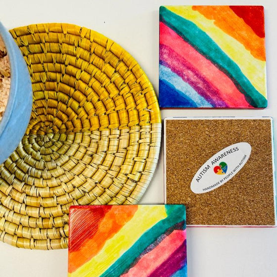 Handmade coasters in rainbow colors.