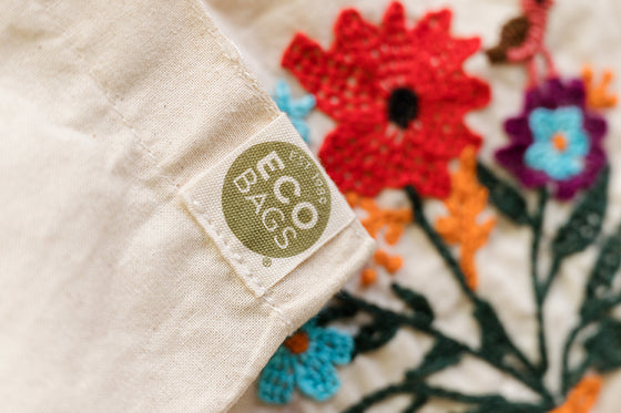 Cotton, Handmade, Purposeful tote bag. Sustainable and hand embroidered by refugee moms.