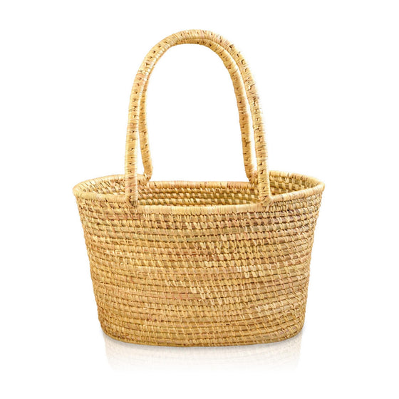 Handmade, handwoven rattan basket, made by women artisans.