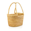 Handmade, handwoven rattan basket, made by women artisans.