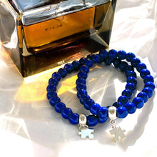 Hand-assembled by people with autism. Each bracelet has an autism charm.