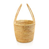 Handmade, handwoven rattan basket, made by women artisans.