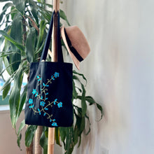  Cotton, Handmade, Purposeful tote bag. Sustainable and hand embroidered by refugee moms.