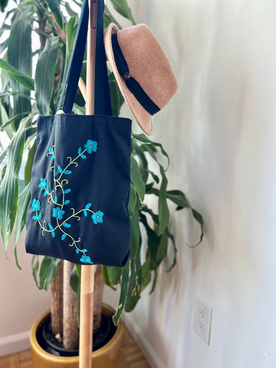 Cotton, Handmade, Purposeful tote bag. Sustainable and hand embroidered by refugee moms.