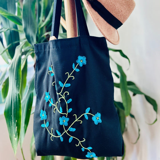 Cotton, Handmade, Purposeful tote bag. Sustainable and hand embroidered by refugee moms.