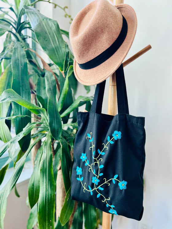 Cotton, Handmade, Purposeful tote bag. Sustainable and hand embroidered by refugee moms.