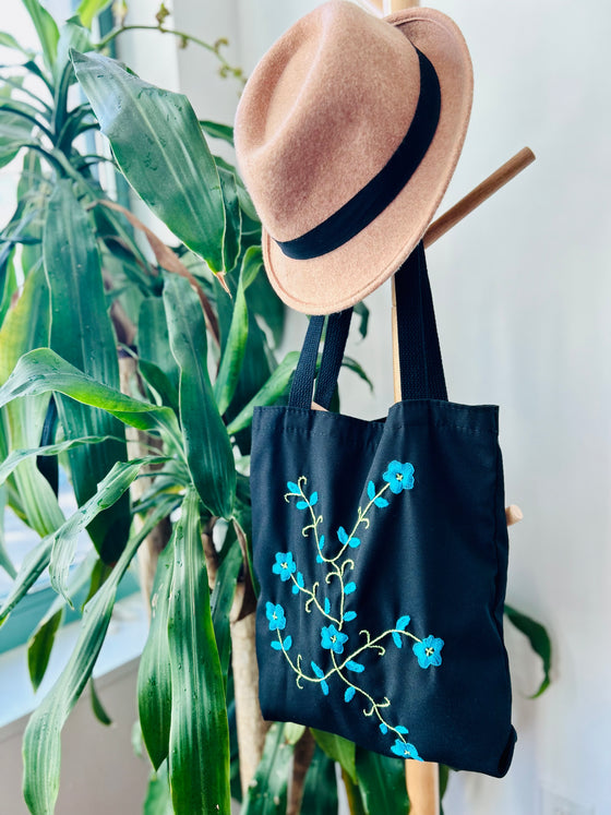 Cotton, Handmade, Purposeful tote bag. Sustainable and hand embroidered by refugee moms.