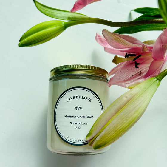 Scent of love candle. Hand poured in United States. Floral and earthy scent. 8 oz candle in a glass jar.