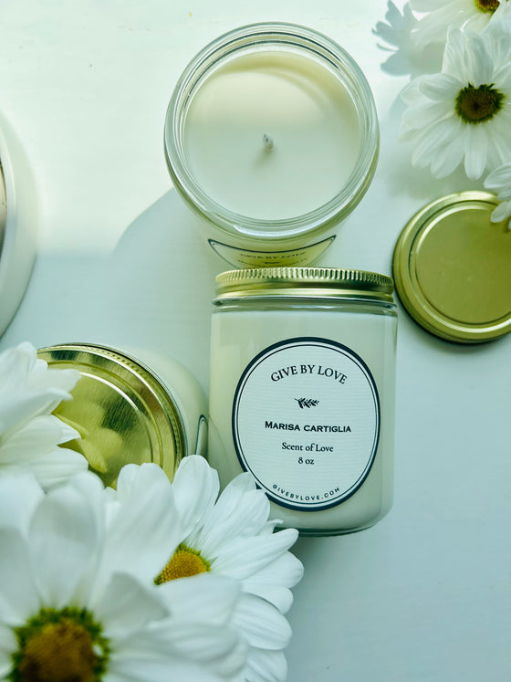 Scent of love candle. Hand poured in United States. Floral and earthy scent. 8 oz candle in a glass jar.