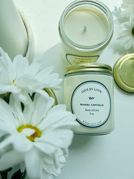 Scent of love candle. Hand poured in United States. Floral and earthy scent. 8 oz candle in a glass jar.