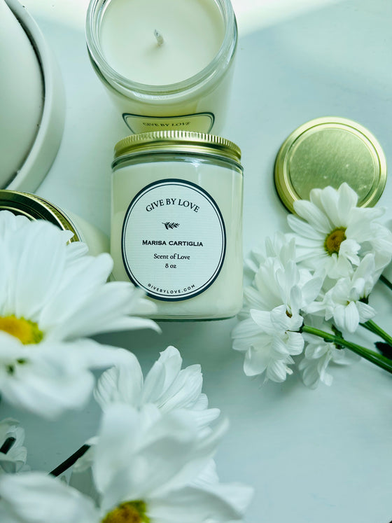Scent of love candle. Hand poured in United States. Floral and earthy scent. 8 oz candle in a glass jar.