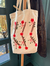 Cotton, Handmade, Purposeful tote bag. Sustainable and hand embroidered by refugee moms.