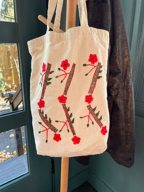 Cotton, Handmade, Purposeful tote bag. Sustainable and hand embroidered by refugee moms.