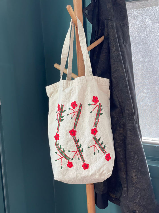 Cotton, Handmade, Purposeful tote bag. Sustainable and hand embroidered by refugee moms.