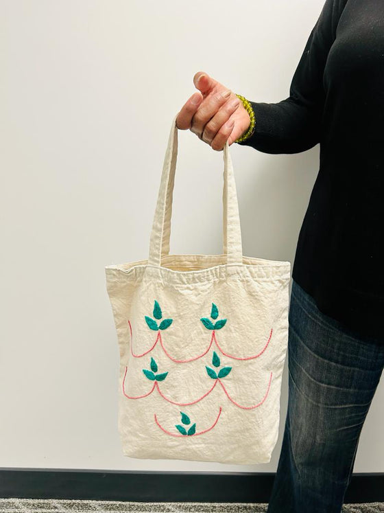 Cotton, Handmade, Purposeful tote bag. Sustainable and hand embroidered by refugee moms.