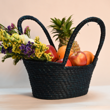  Traditional handwoven picnic basket made from sustainable materials. The basket has an intricate weaving pattern. The basket has sturdy handles for easy transport and is perfect for outdoor picnics, beach trips, or as a stylish storage solution at home.